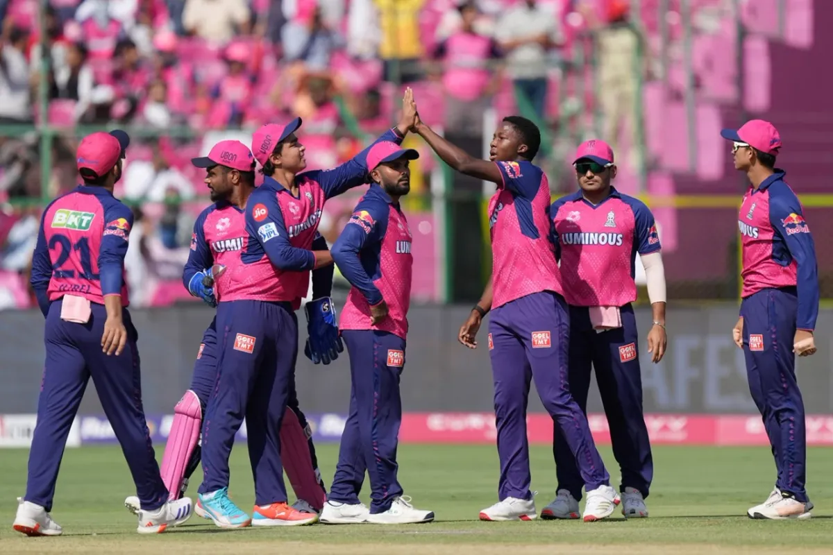 IPL player doing victory lap around stadium